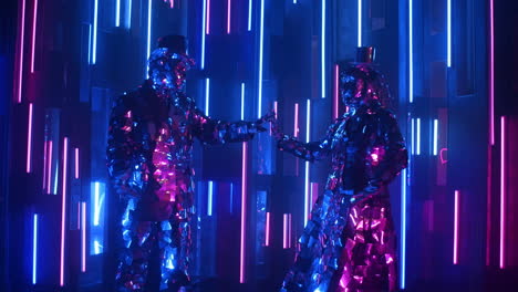 a-fun-dancing-couple-in-mirrored-costumes-perform-a-looping-motion.